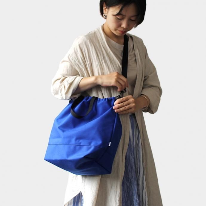 143397065 This is... / Cordura Drawstring Shoulder Bag コーデュラドローストリングショルダーバッグ - ターコイズ 02
